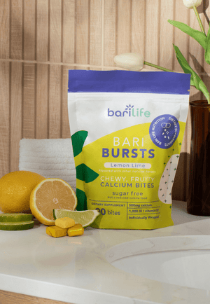 BariLife Bari Bursts Lemon Lime calcium bites with lemon and lime in a bright kitchen setting.