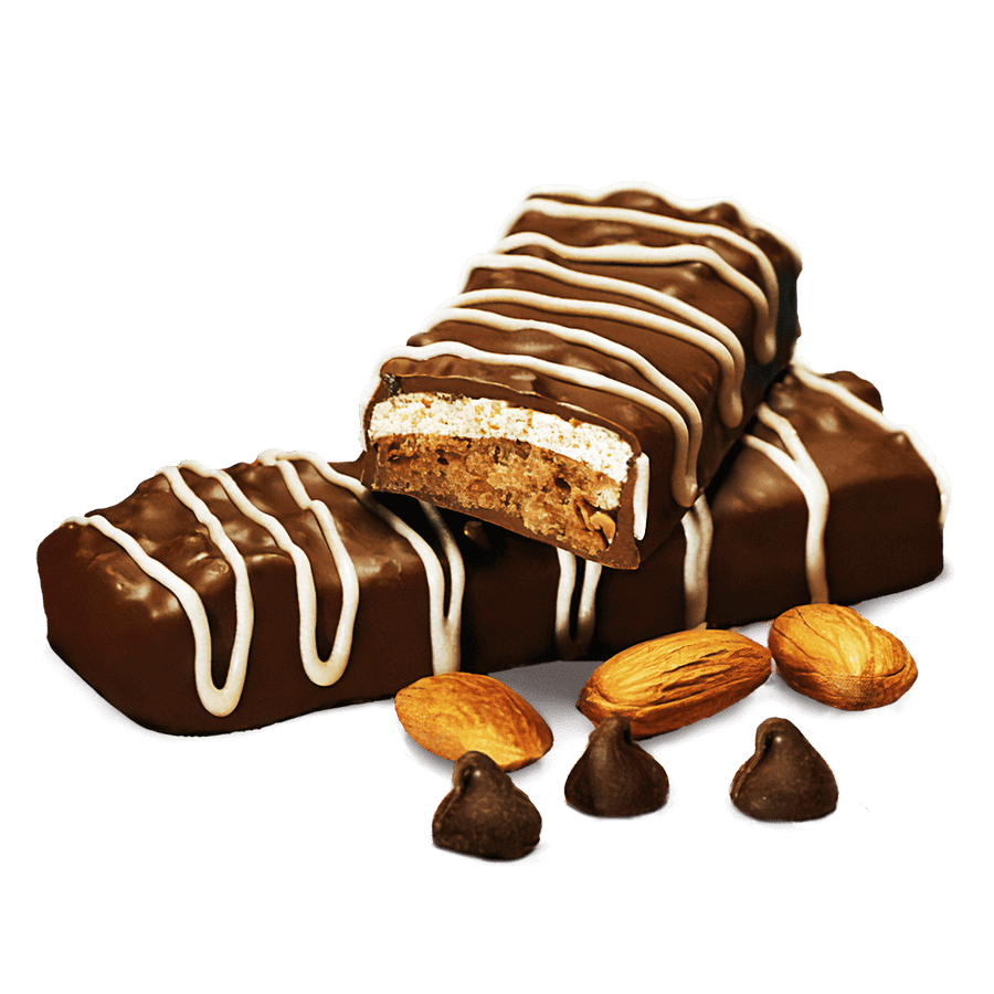 Decadent chocolate protein bars with a creamy filling, garnished with almonds and chocolate chips.